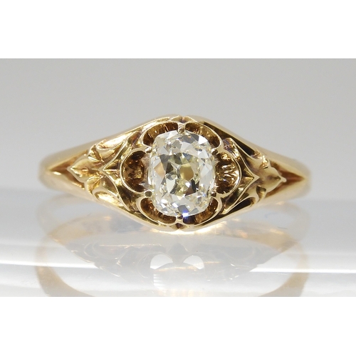 687 - A VINTAGE DIAMOND SOLITAIREset with a cushion cut old cut diamond, with an estimated approx carat we... 