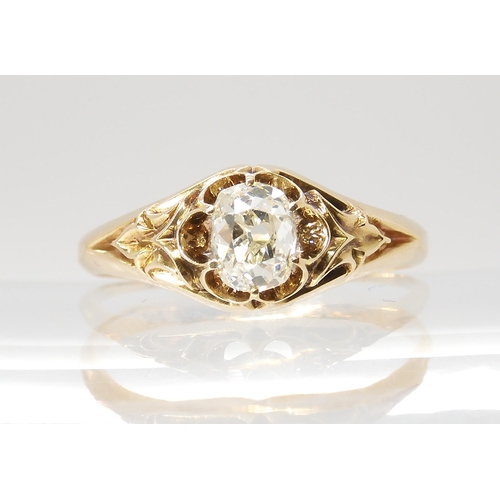 687 - A VINTAGE DIAMOND SOLITAIREset with a cushion cut old cut diamond, with an estimated approx carat we... 