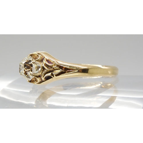 687 - A VINTAGE DIAMOND SOLITAIREset with a cushion cut old cut diamond, with an estimated approx carat we... 