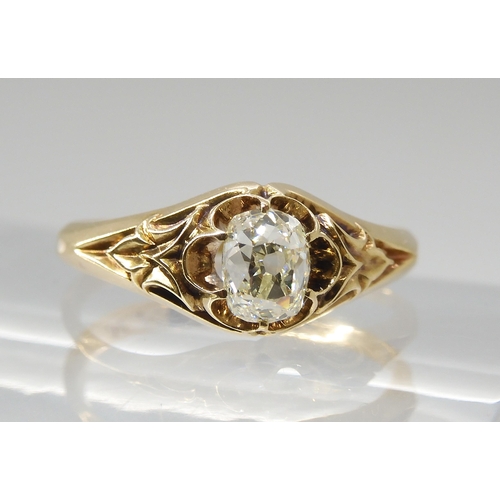 687 - A VINTAGE DIAMOND SOLITAIREset with a cushion cut old cut diamond, with an estimated approx carat we... 