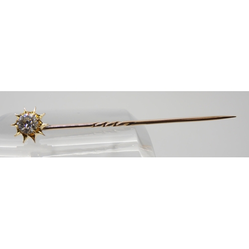 689 - A BOXED DIAMOND TOPPED SUNBURST PINthat also converts to a shirt stud, set with an estimated approx ... 