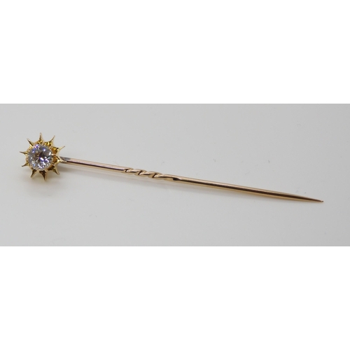 689 - A BOXED DIAMOND TOPPED SUNBURST PINthat also converts to a shirt stud, set with an estimated approx ... 