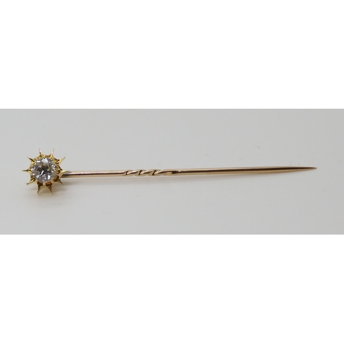 689 - A BOXED DIAMOND TOPPED SUNBURST PINthat also converts to a shirt stud, set with an estimated approx ... 