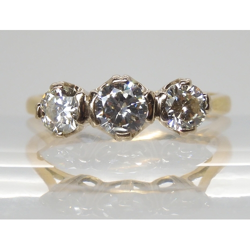 691 - AN 18CT GOLD THREE STONE DIAMOND RINGset with estimated approx 1ct of brilliant cut diamonds. Finger... 