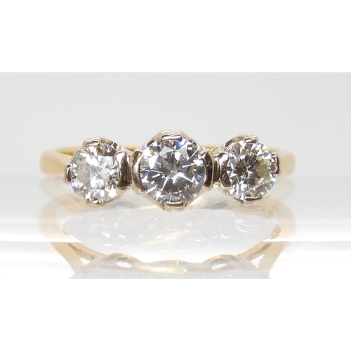 691 - AN 18CT GOLD THREE STONE DIAMOND RINGset with estimated approx 1ct of brilliant cut diamonds. Finger... 