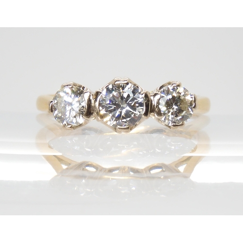 691 - AN 18CT GOLD THREE STONE DIAMOND RINGset with estimated approx 1ct of brilliant cut diamonds. Finger... 