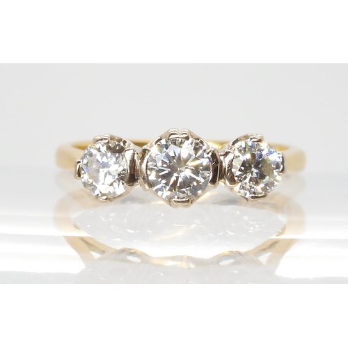 691 - AN 18CT GOLD THREE STONE DIAMOND RINGset with estimated approx 1ct of brilliant cut diamonds. Finger... 