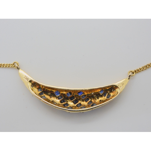 706 - TWO NECKLACESan 18ct gold sapphire and diamond crescent shaped pendant necklace, length 44cm, weight... 