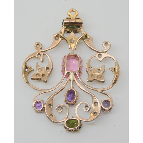 707 - AN EDWARDIAN DIAMOND AND GEM SET PENDANTset with rose cut diamonds, tourmalines and other gems in ye... 