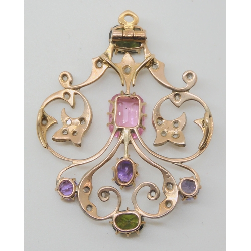 707 - AN EDWARDIAN DIAMOND AND GEM SET PENDANTset with rose cut diamonds, tourmalines and other gems in ye... 