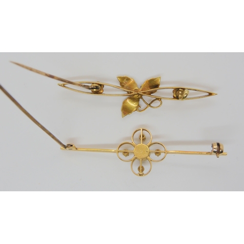 708 - TWO VINTAGE BROOCHESan 18ct gold diamond and pearl four lobed flower brooch, dimensions 5.3cm x 1.7c... 