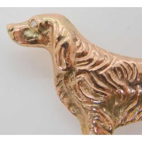 716 - A 9CT ROSE GOLD RED SETTER DOG BROOCHthe eye set with a diamond, this item was made bespoke. Dimensi... 