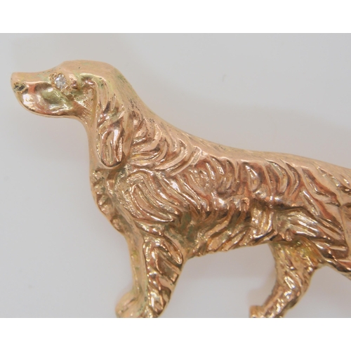 716 - A 9CT ROSE GOLD RED SETTER DOG BROOCHthe eye set with a diamond, this item was made bespoke. Dimensi... 