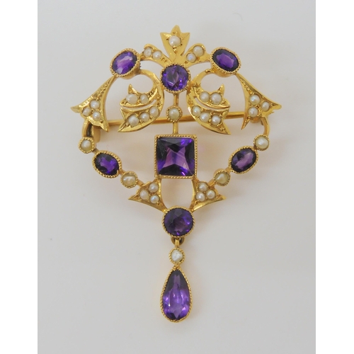 720 - A 9CT GOLD EDWARDIAN PENDANT BROOCHset with square, oval, pear shaped, and round amethysts and split... 