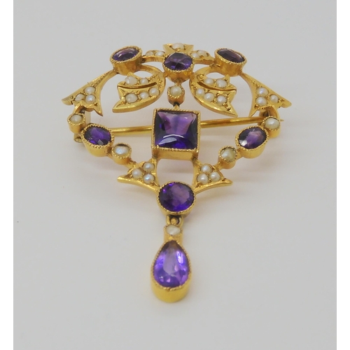 720 - A 9CT GOLD EDWARDIAN PENDANT BROOCHset with square, oval, pear shaped, and round amethysts and split... 