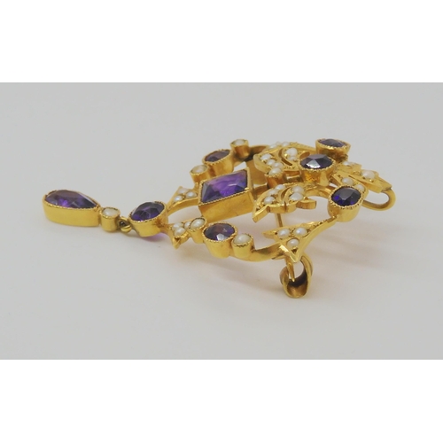 720 - A 9CT GOLD EDWARDIAN PENDANT BROOCHset with square, oval, pear shaped, and round amethysts and split... 