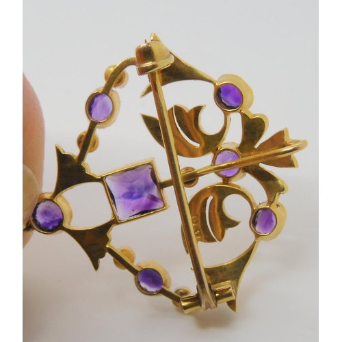 720 - A 9CT GOLD EDWARDIAN PENDANT BROOCHset with square, oval, pear shaped, and round amethysts and split... 