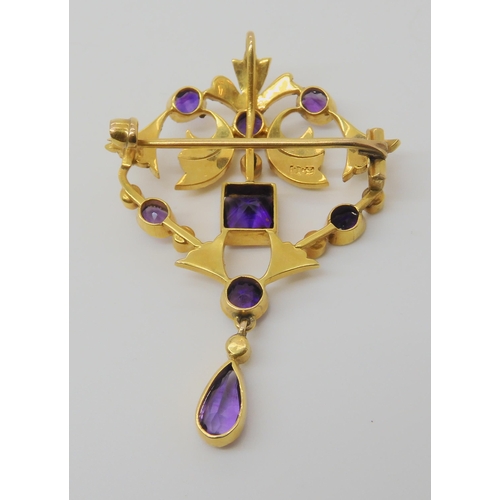 720 - A 9CT GOLD EDWARDIAN PENDANT BROOCHset with square, oval, pear shaped, and round amethysts and split... 