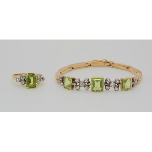 726 - A PERIDOT AND DIAMOND BRACELET & MATCHING RINGthe yellow metal expanding bracelet is stamped Lon... 