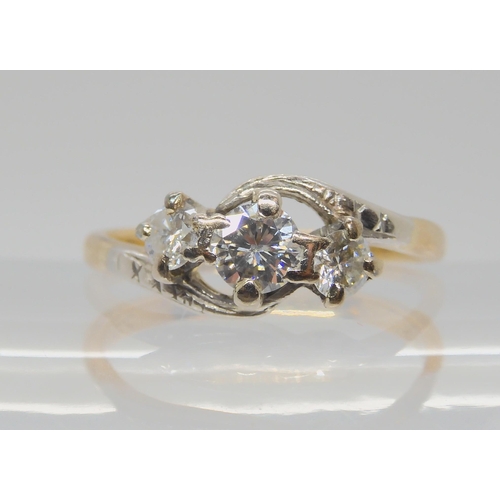 727 - A VINTAGE THREE STONE DIAMOND RING set with estimated approx 0.50cts of brilliant cut diamonds, fing... 