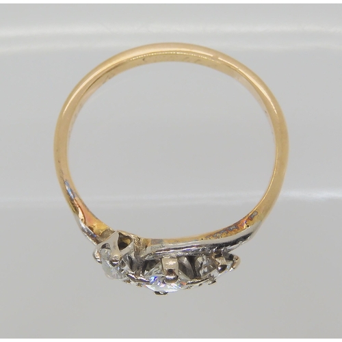 727 - A VINTAGE THREE STONE DIAMOND RING set with estimated approx 0.50cts of brilliant cut diamonds, fing... 