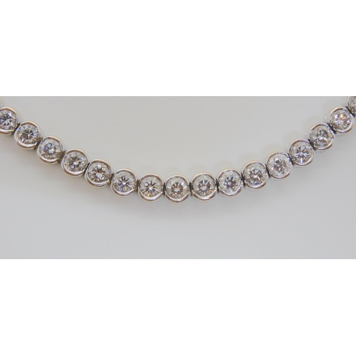 728 - AN 18CT WHITE GOLD DIAMOND TENNIS BRACELETset with estimated approx 4.5cts of brilliant cut diamonds... 