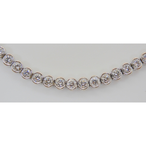 728 - AN 18CT WHITE GOLD DIAMOND TENNIS BRACELETset with estimated approx 4.5cts of brilliant cut diamonds... 