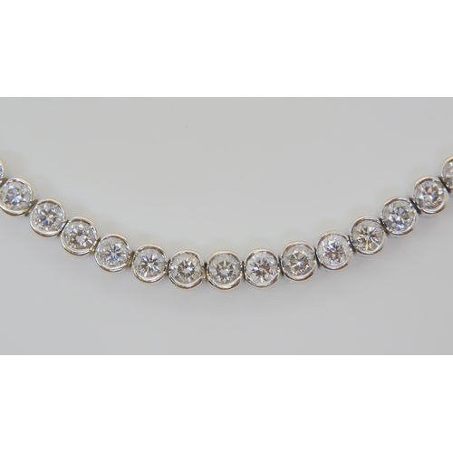 728 - AN 18CT WHITE GOLD DIAMOND TENNIS BRACELETset with estimated approx 4.5cts of brilliant cut diamonds... 