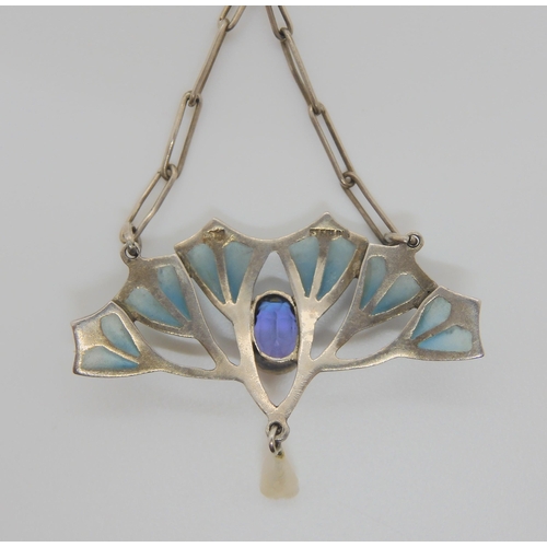 732 - AN ART NOUVEAU PENDANT BY ERNST GIDEON BEKset with a faux sapphire in a milligrain setting, to the f... 