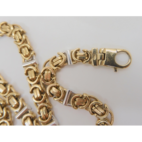 735 - A 9CT FANCY NECK CHAINmade in both yellow and white gold with Sheffield import marks. length 42.5cm,... 