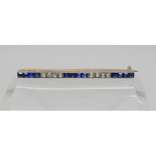 750 - A SAPPHIRE & DIAMOND BAR BROOCH the square cut sapphires and rose cut diamonds are channel set i... 