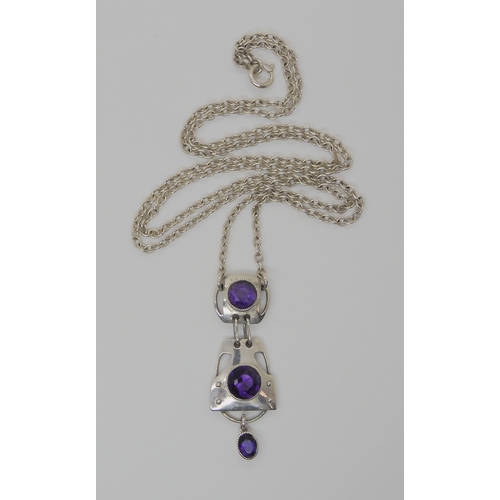 752 - A MURRLE BENNETT AMETHYST PENDANTwith three sections, each set with an amethyst, total length of the... 