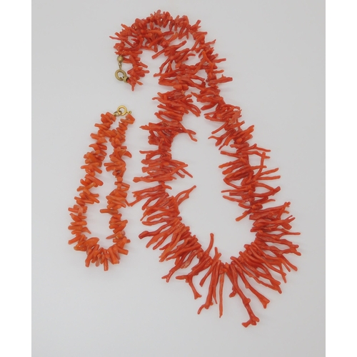 755 - TWO VINTAGE CORAL NECKLACESa red coral fringe necklace, longest point approx 3.2cm, to shortest appr... 