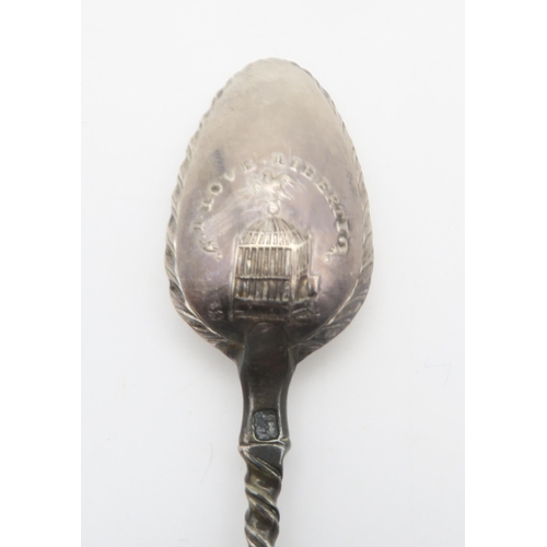 416 - A George III silver Old English pattern picture back tea spoon, the reverse of the bowl embossed wit... 