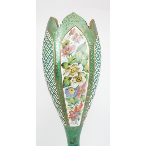 151 - A PAIR OF BOHEMIAN GREEN GLASS VASESof tulip form with alternating cameo panels of painted flowers a... 