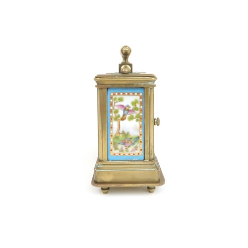 156 - A 19TH CENTURY FRENCH MINIATURE BRASS AND PORCELAIN CARRIAGE CLOCK AND BAROMETEReach with a porcelai... 