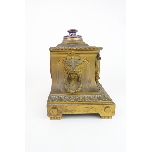 158 - A RICHARD AND CO FRENCH MANTLE CLOCKthe ormolu case with lion head handles, swags of laurel, and  ac... 