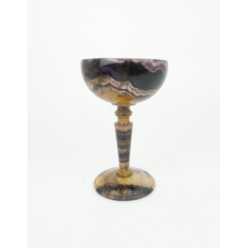 162 - A DERBYSHIRE BLUE JOHN TAZZAthe dished bowl on tapering stem and spreading foot, 19.5cm high... 