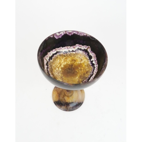 162 - A DERBYSHIRE BLUE JOHN TAZZAthe dished bowl on tapering stem and spreading foot, 19.5cm high... 