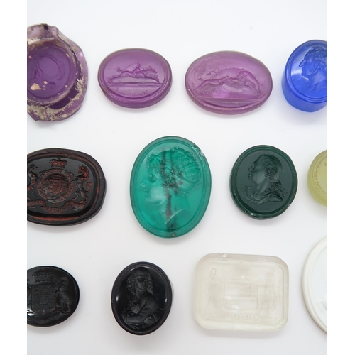 164 - A COLLECTION OF FIFTEEN INTAGLIO SEALSmainly coloured glass including The glorious and immortal Heno... 