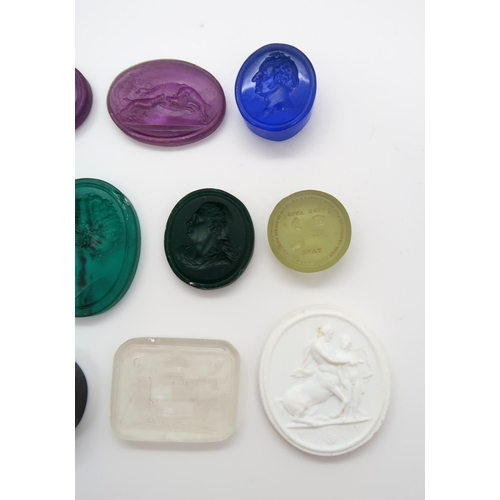 164 - A COLLECTION OF FIFTEEN INTAGLIO SEALSmainly coloured glass including The glorious and immortal Heno... 
