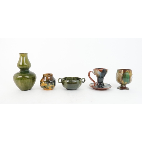 172 - A COLLECTION OF DUNMORE POTTERYto include a green glazed two handled bowl, a dimpled pot in shades o... 