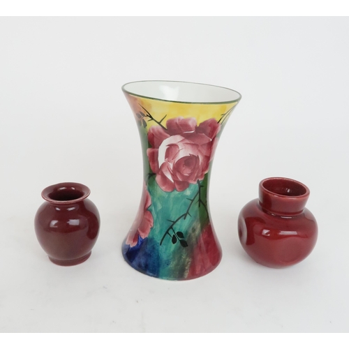 182 - A COLLECTION OF WEMYSS POTTERYincluding a jazzy ware vase painted with cabbage roses, 16cm high, a d... 