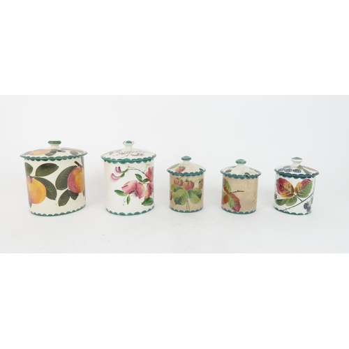 184 - A WEMYSS SWEET PEA DECORATED BISCUIT JAR AND COVERa further jar and cover painted with apples, two b... 