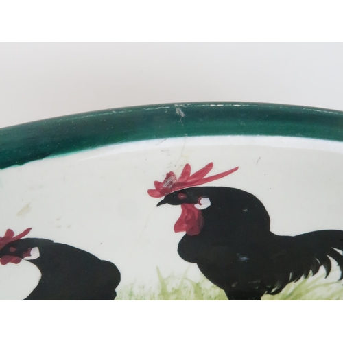 185 - A WEMYSS WARE EWER AND BASINin black cockerel & hens pattern, both with T Goode and Co stamp, ba... 