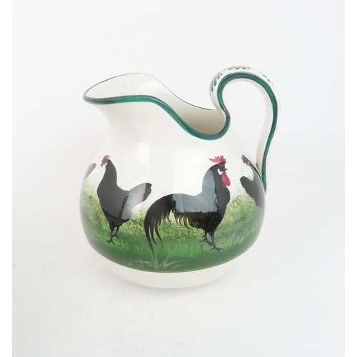 185 - A WEMYSS WARE EWER AND BASINin black cockerel & hens pattern, both with T Goode and Co stamp, ba... 