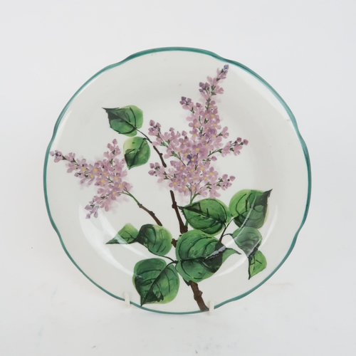 186 - A WEMYSS LILAC PATTERN PLATEwith wavy rim, 21cm diameter, a commemorative heart shaped tray depictin... 