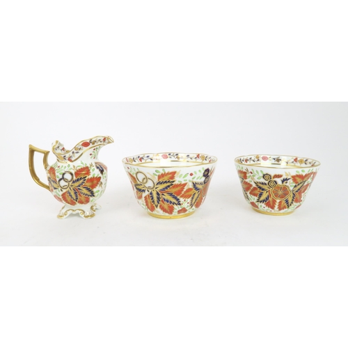 187 - A LATE 19TH CENTURY COPELAND TEA SERVICEin pattern 1559, decorated in the imari palette with leaves ... 