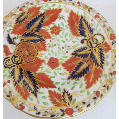 187 - A LATE 19TH CENTURY COPELAND TEA SERVICEin pattern 1559, decorated in the imari palette with leaves ... 