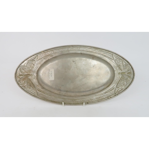 201 - MARGARET GILMOUR (1863-1942) GLASGOW SCHOOLAn Arts and Crafts white metal tray of oval form with but... 